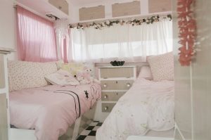 Retro pink bedroom in a caravan